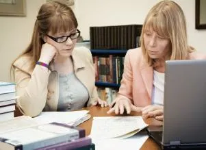 teachers reviewing assessment data