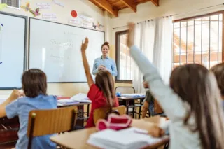 Logos for Lexia LETRS in red with an open book icon and Lexia Core5 Reading in blue with a globe icon.
