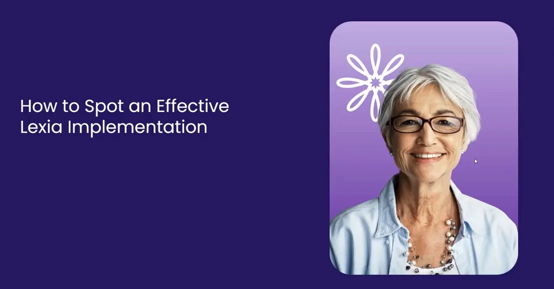 A woman in glasses stands smiling with folded arms next to a sign reading Lexia: Making Literacy Gains Visible.