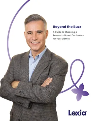 Smiling man in a blazer stands with arms crossed next to text about choosing a research-based curriculum for districts.