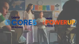 A teacher and student smile in a classroom with “CORE5 Reading” and “POWERUP Literacy” logos onscreen.