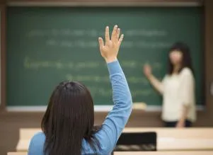 middle school girl raising hand