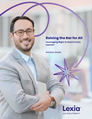 Smiling man in glasses and beige suit holding a tablet, with text: “Raising the Bar for All” and Lexia logo.