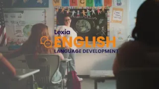 A teacher stands by a chalkboard in a classroom with students; text reads Lexia English Language Development.